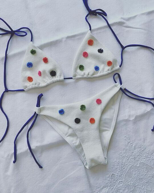 White swimsuit with decorations