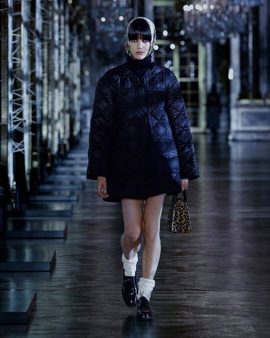 Black quilted down jacket