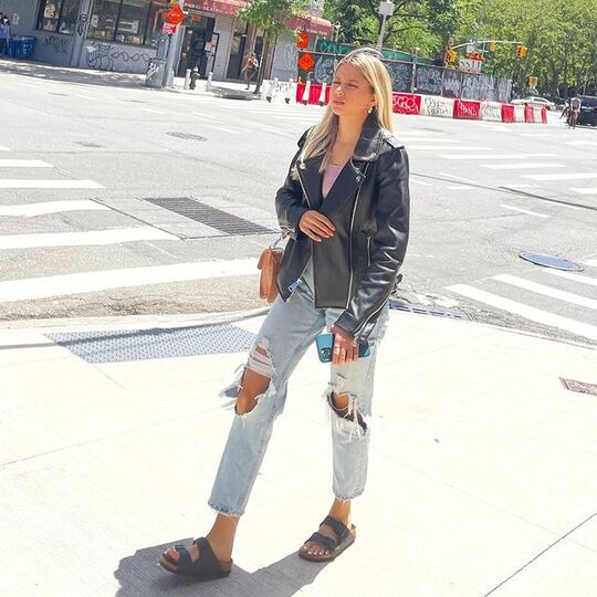 Ripped jeans and a braid