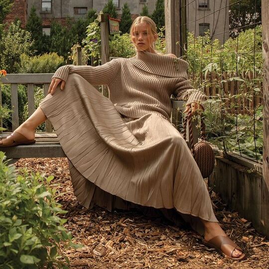 Sweater and pleated skirt