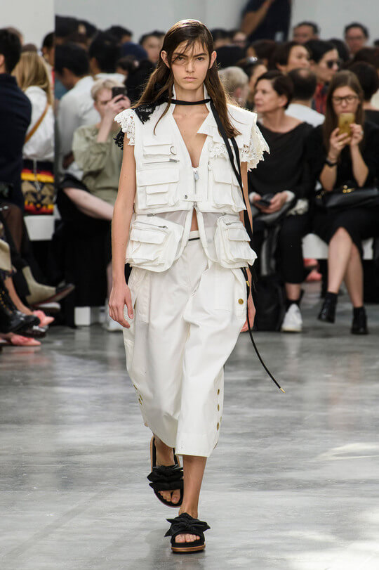 White vest with pockets