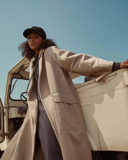 Black cap with trench coat