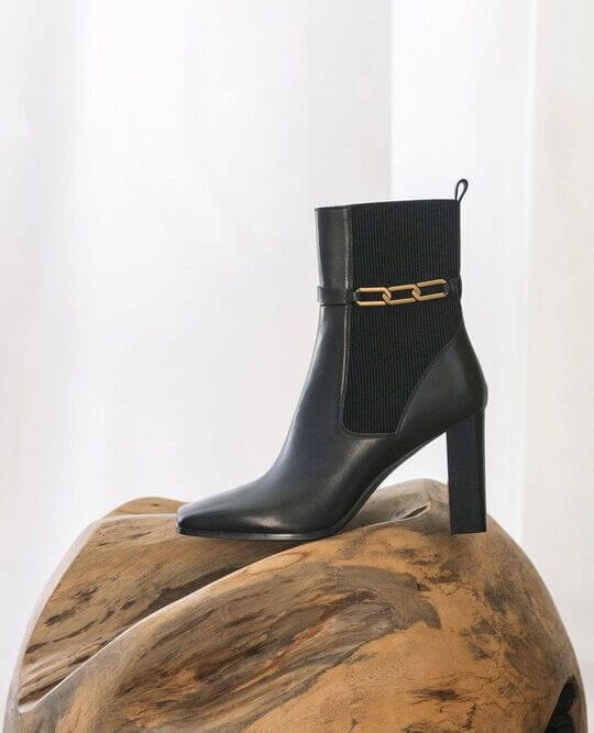 Black ankle boots with chain