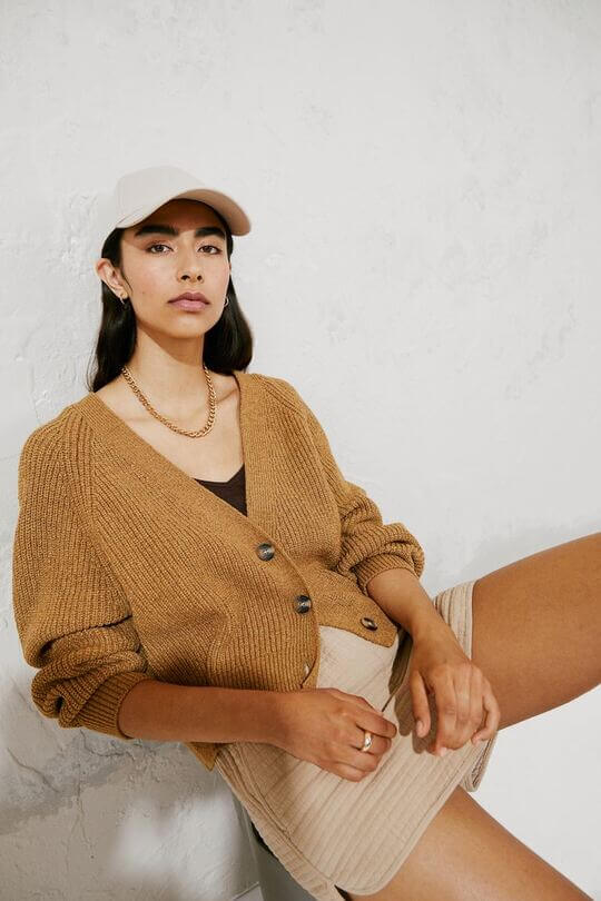 With cardigan