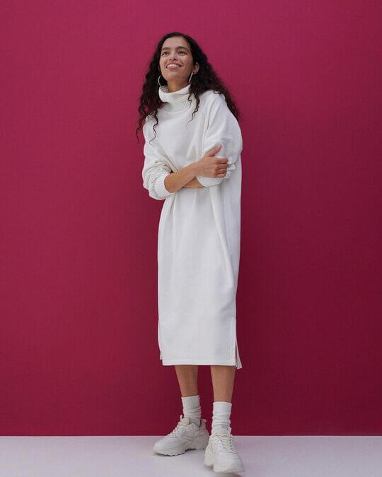 With sneakers and dress