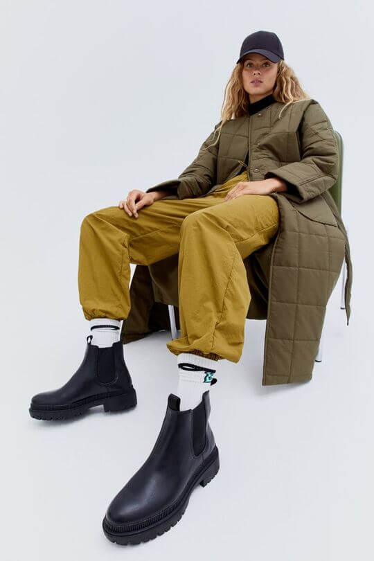 With Chelsea boots