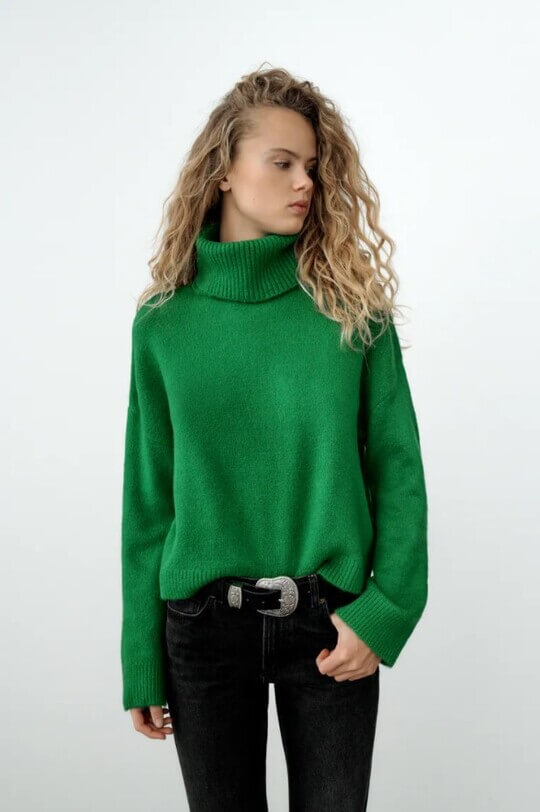 Sweater in trousers