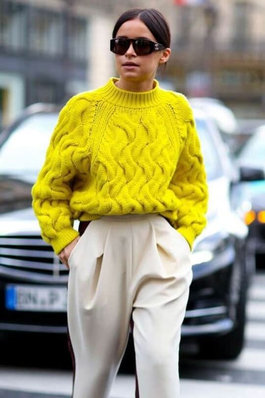Bright sweater in trousers