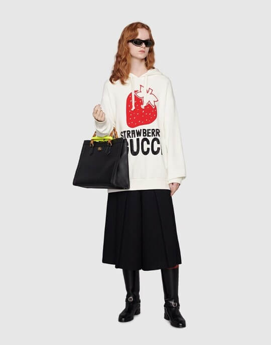 Hoodie with a drawing by Gucci