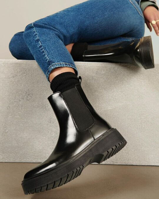 With boots