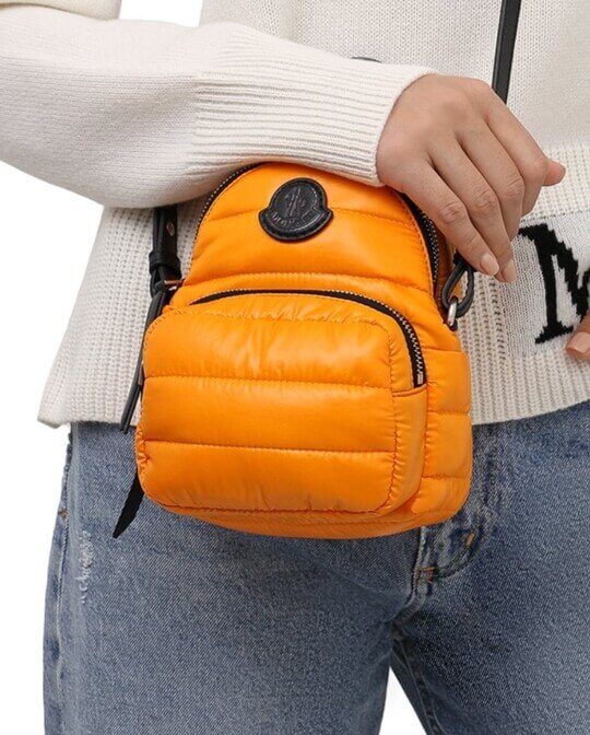 Orange backpack with patch