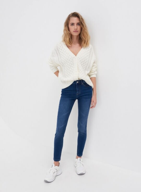 With white cardigan