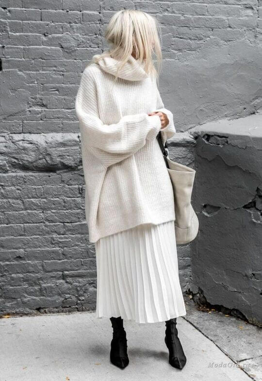 With pleated skirt