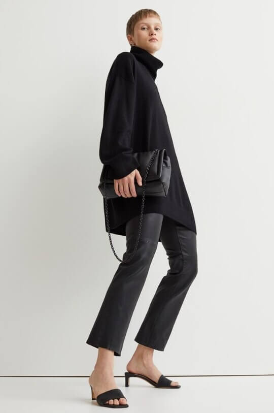 With oversize sweater