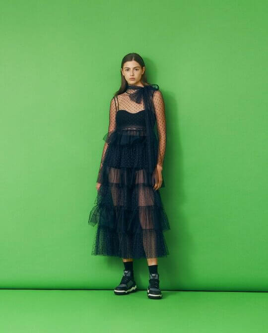 Black dress of complex cut