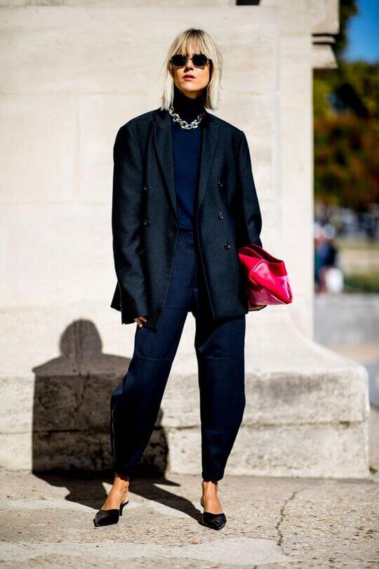 With trousers and jacket