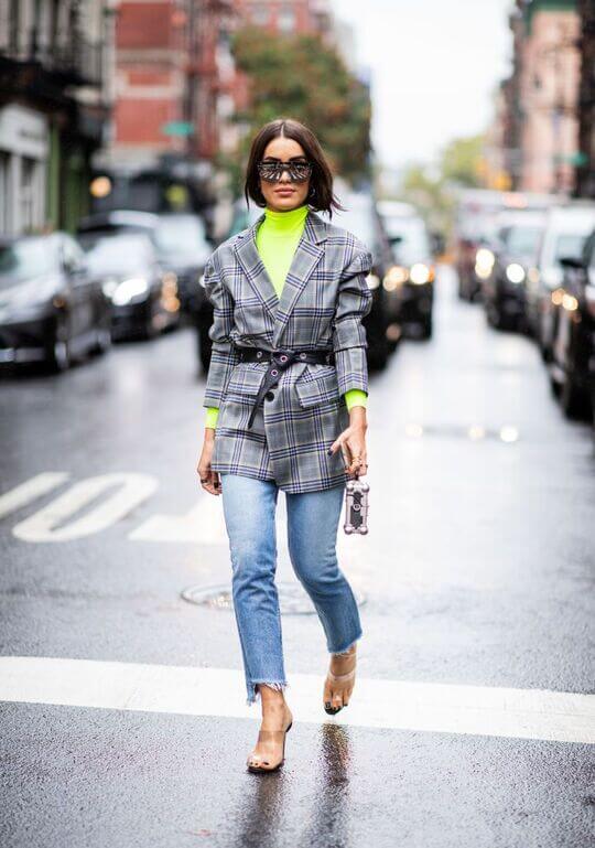 With jacket and jeans
