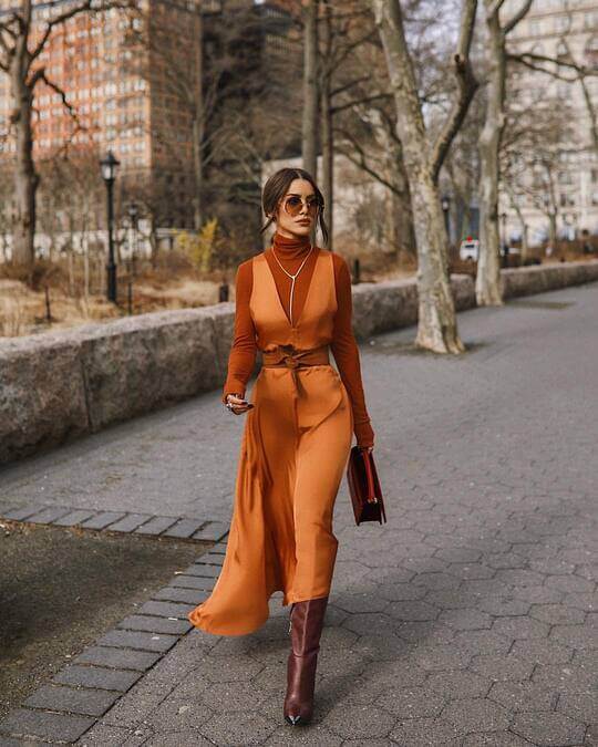 With orange dress
