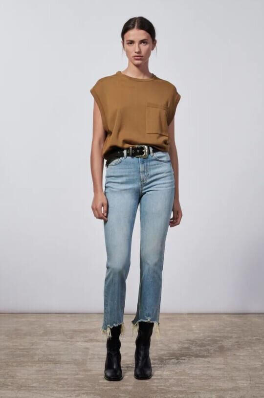 Jeans with a torn bottom