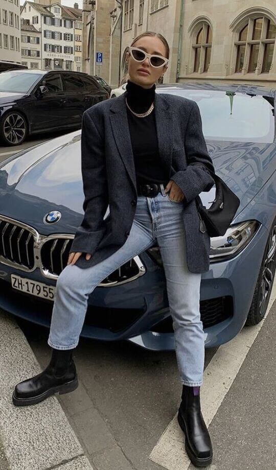 With a black turtleneck