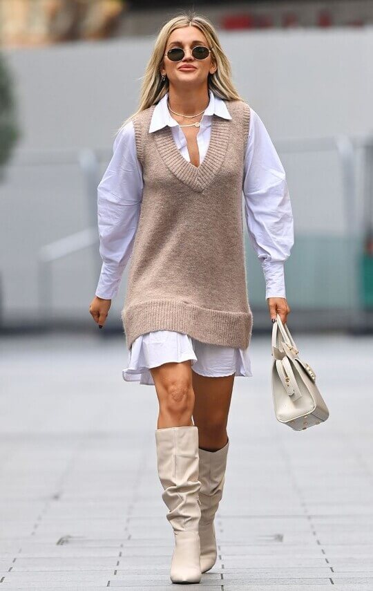 With knitted vest