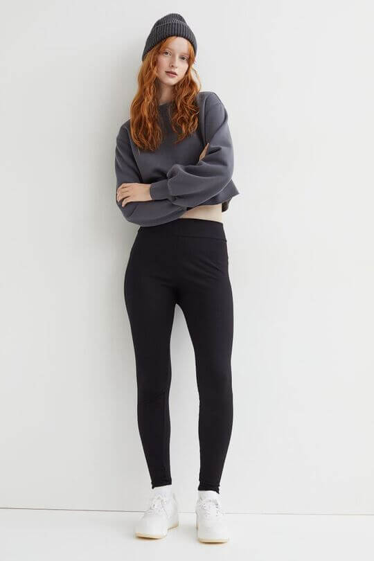 With a short sweatshirt