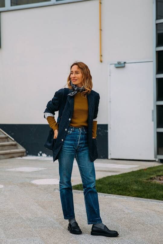 With jacket and loafers
