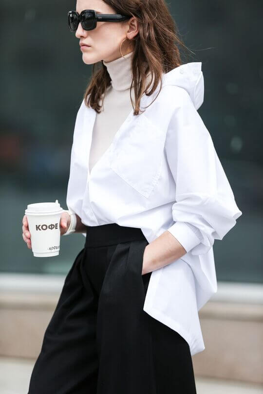 With a white turtleneck