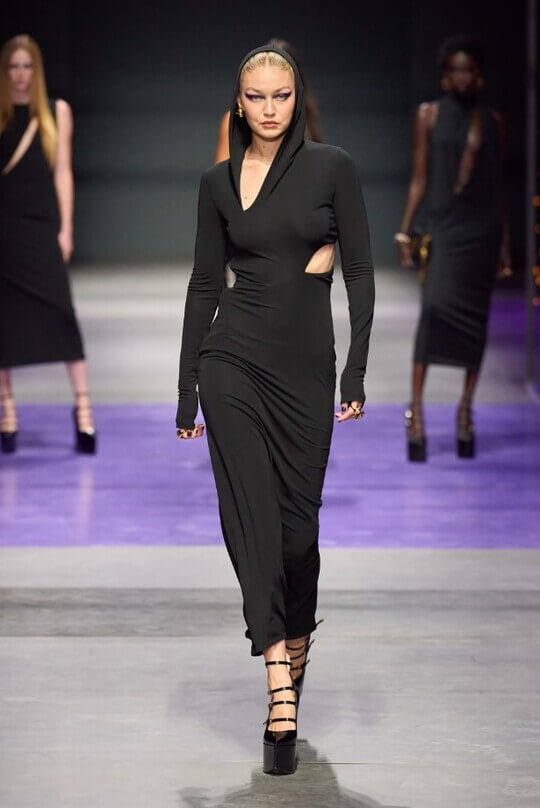 Hoods in summer clothes at the Versace show