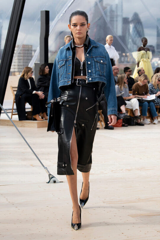 Skirt suit with shortened top by Alexander McQueen