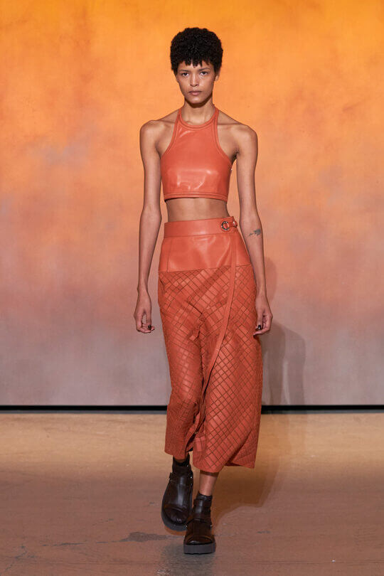 Leather skirt with Hermes suit top