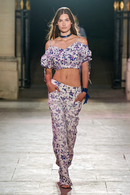 Top with active print visually enhances breasts