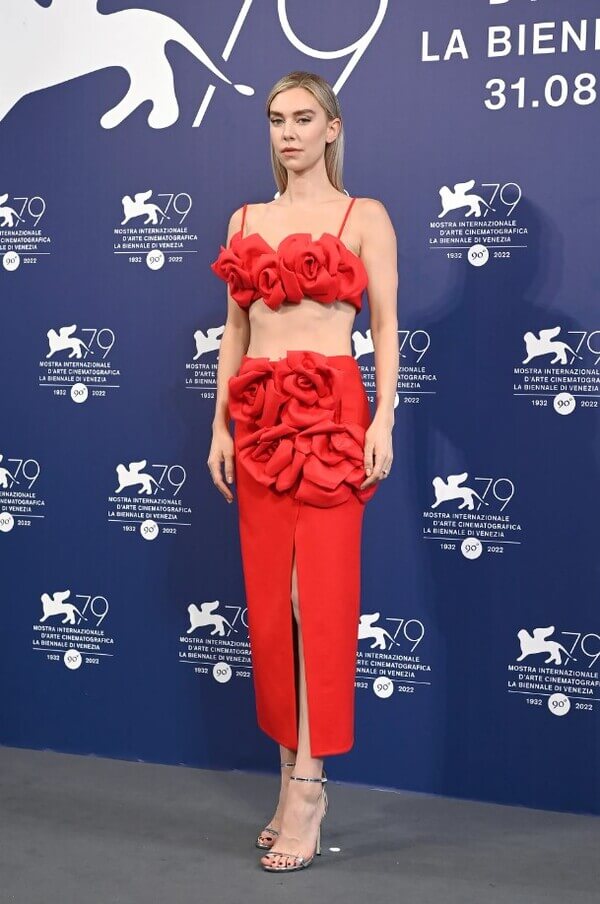 Vanessa Kirby in a red skirt and top by Valentino