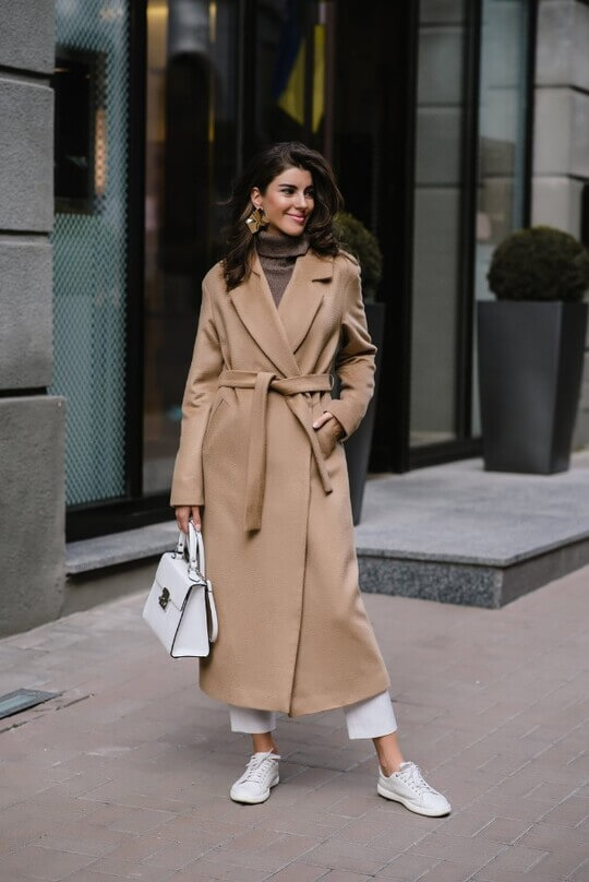 Coat with a belt for an hourglass figure