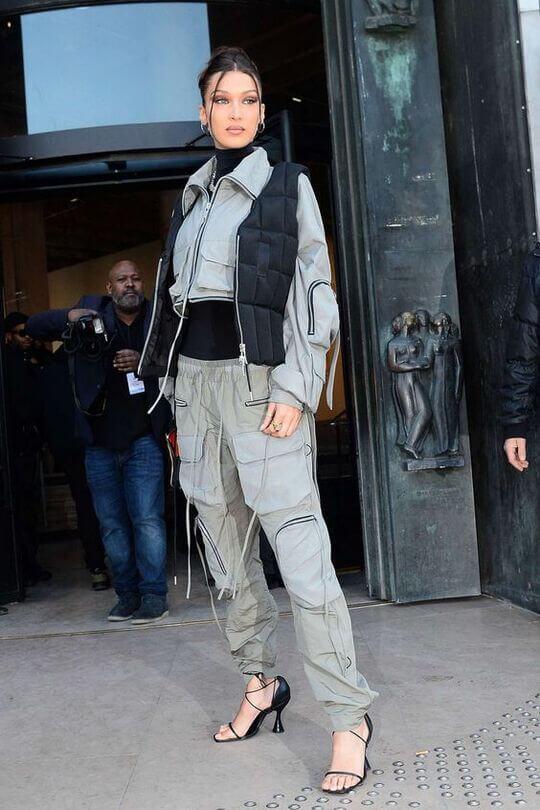 Bella Hadid in gray cargos with heeled shoes