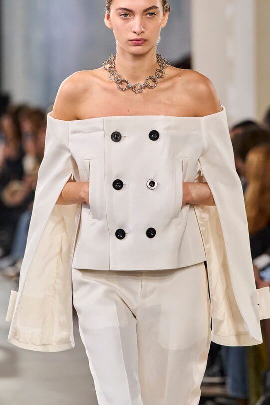 White Sacai blazer with open shoulders